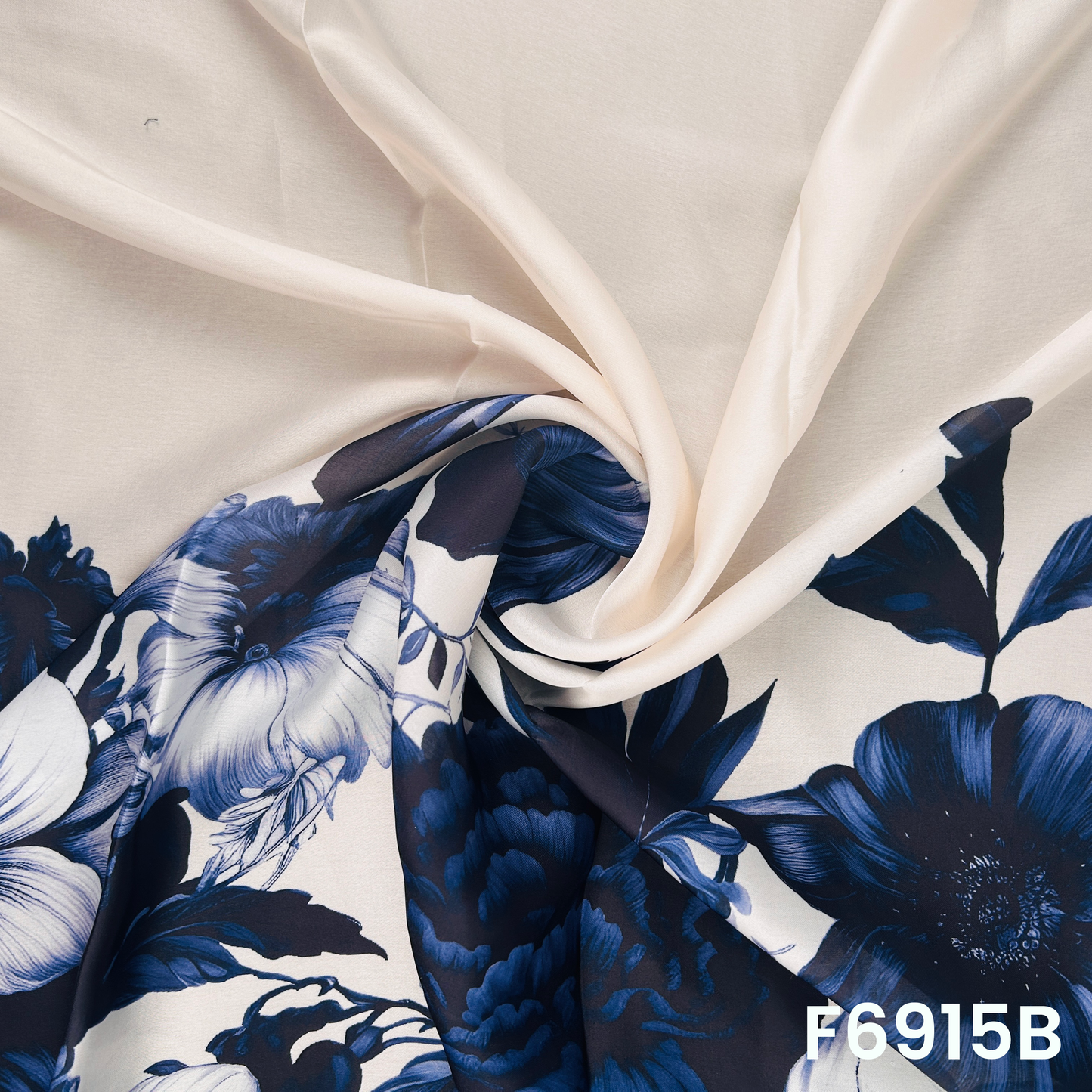 Draped F6915B fabric highlighting silky folds, elegant flower placement and premium glossy texture