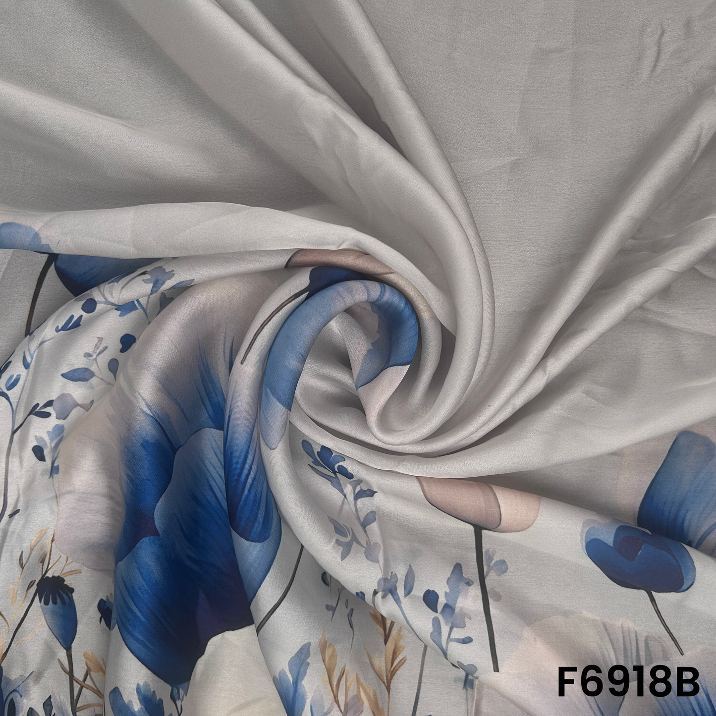 Draped F6918B fabric highlighting silky folds, airy floral placement and premium smooth texture
