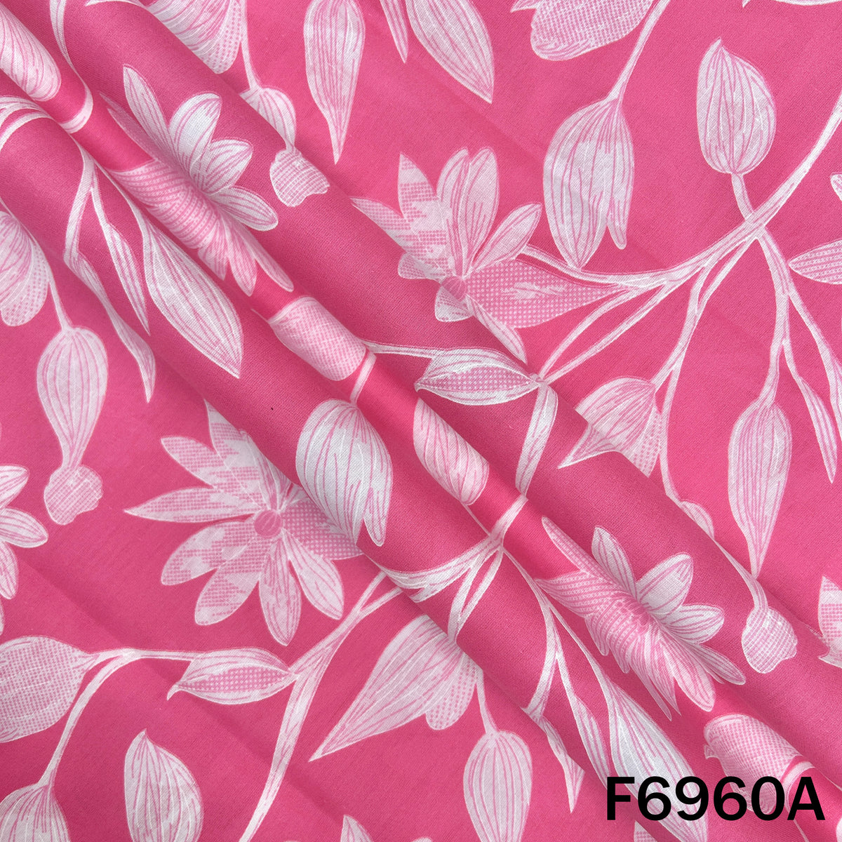 Close view of F6960A showing large floral outlines, smooth cotton texture and fresh summer styling