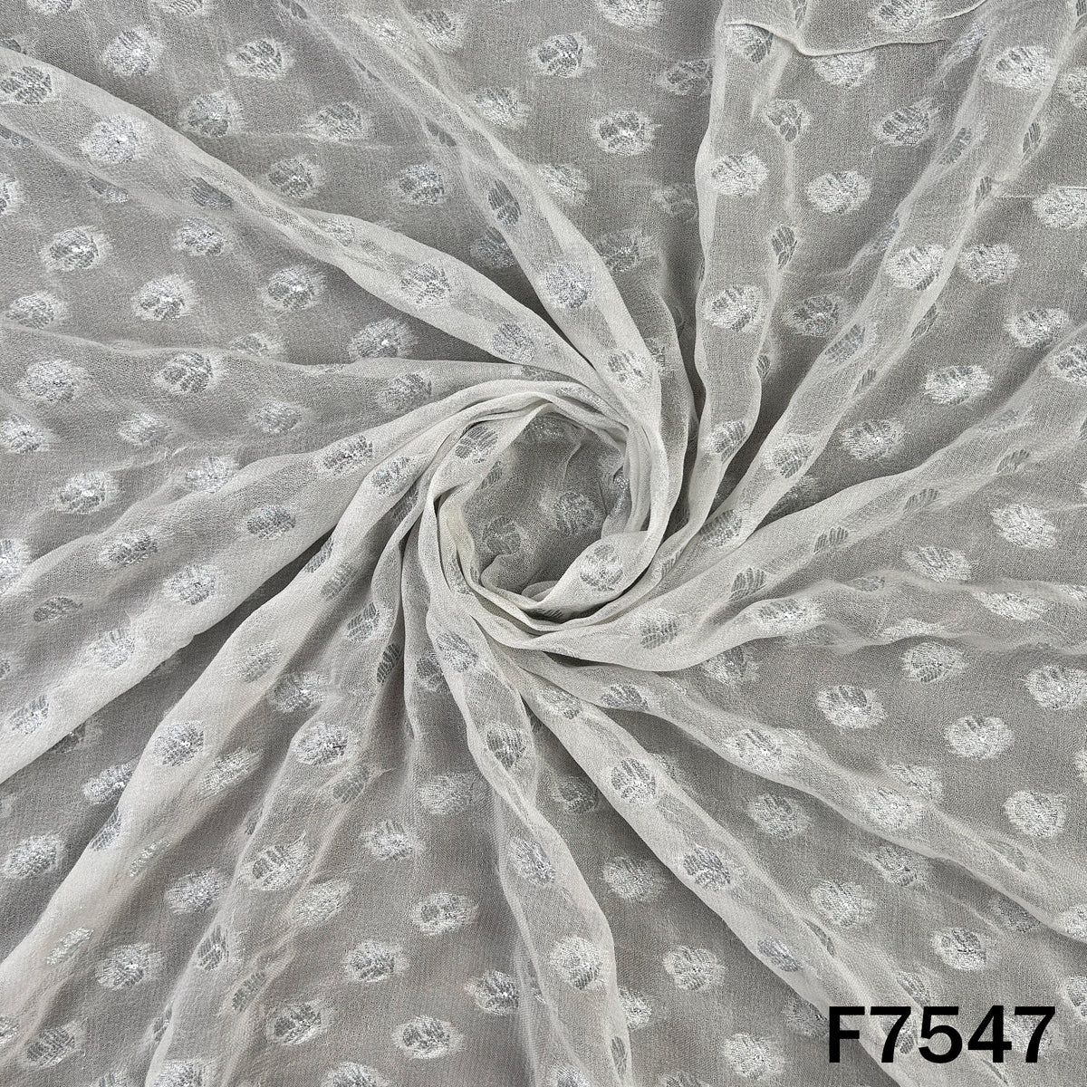 Designer white georgette fabric with scattered zari work