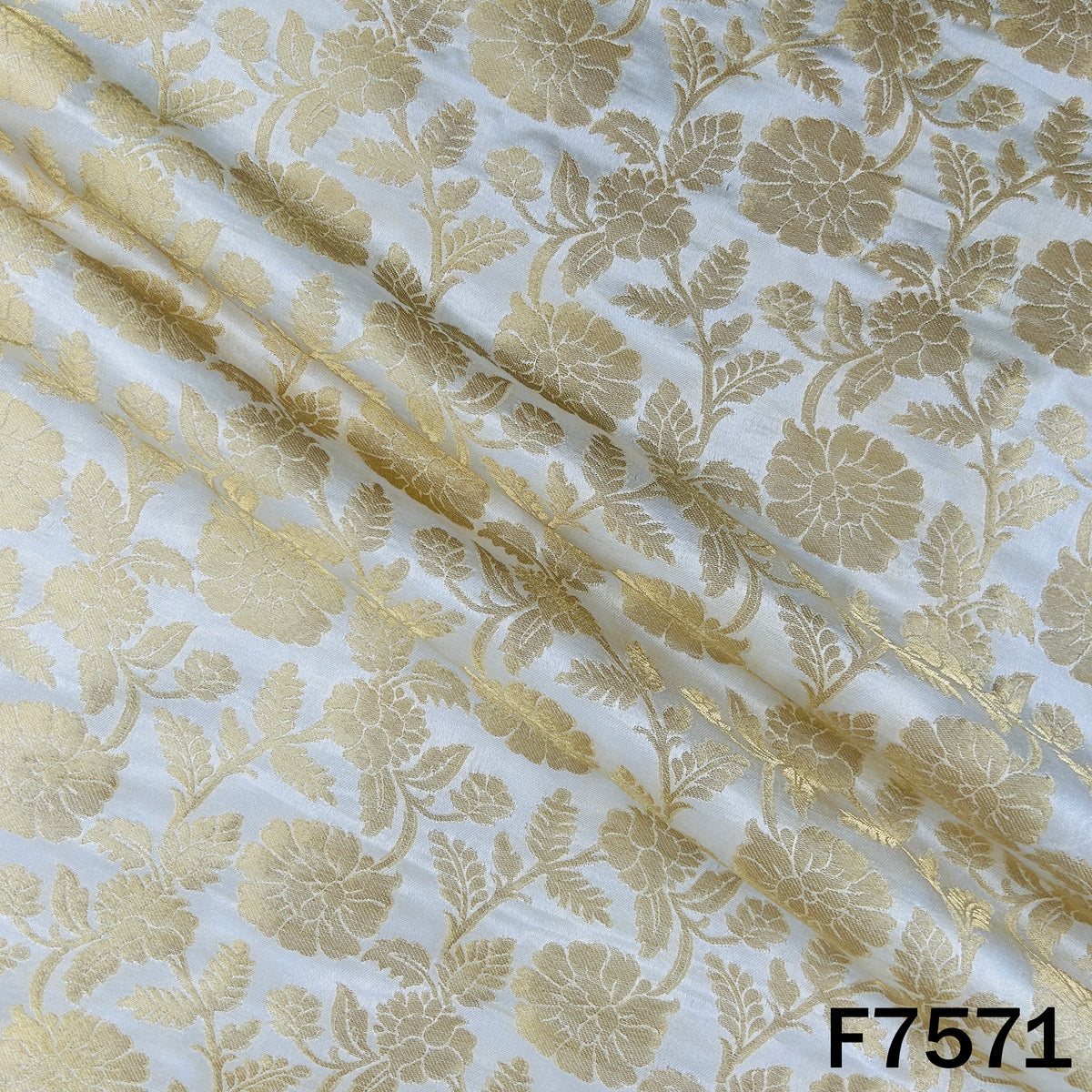 Ivory designer brocade fabric with woven golden florals