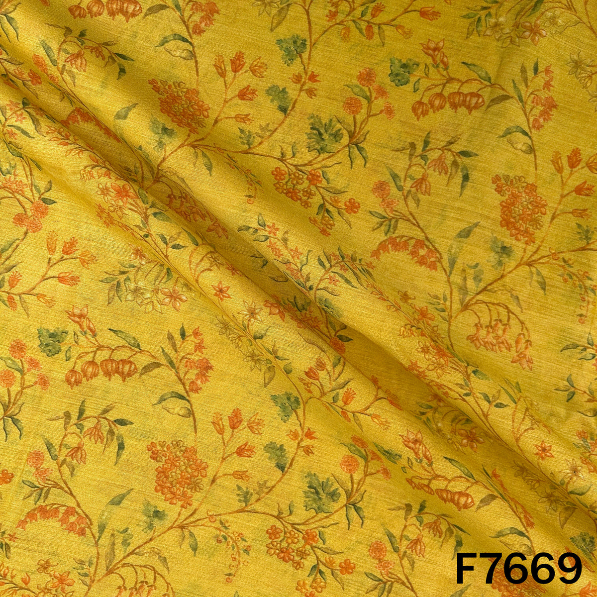 Draped yellow Pure Monga silk fabric with elegant floral vine print