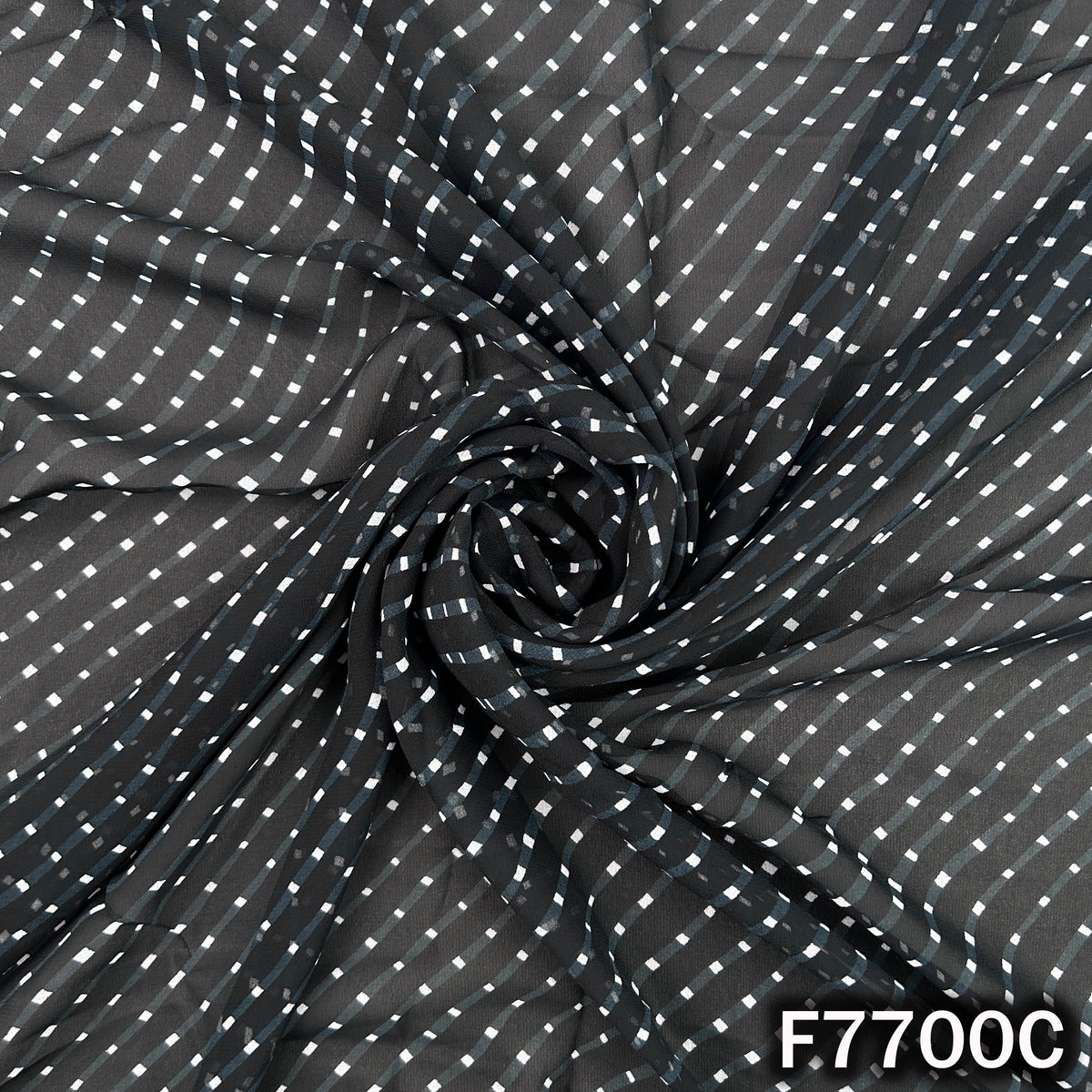 Draped black Laheriya georgette with delicate white stripes