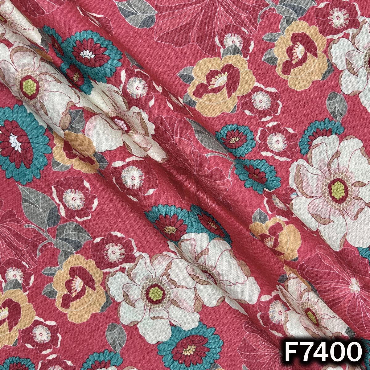 Designer rayon fabric with bold multicolor floral pattern