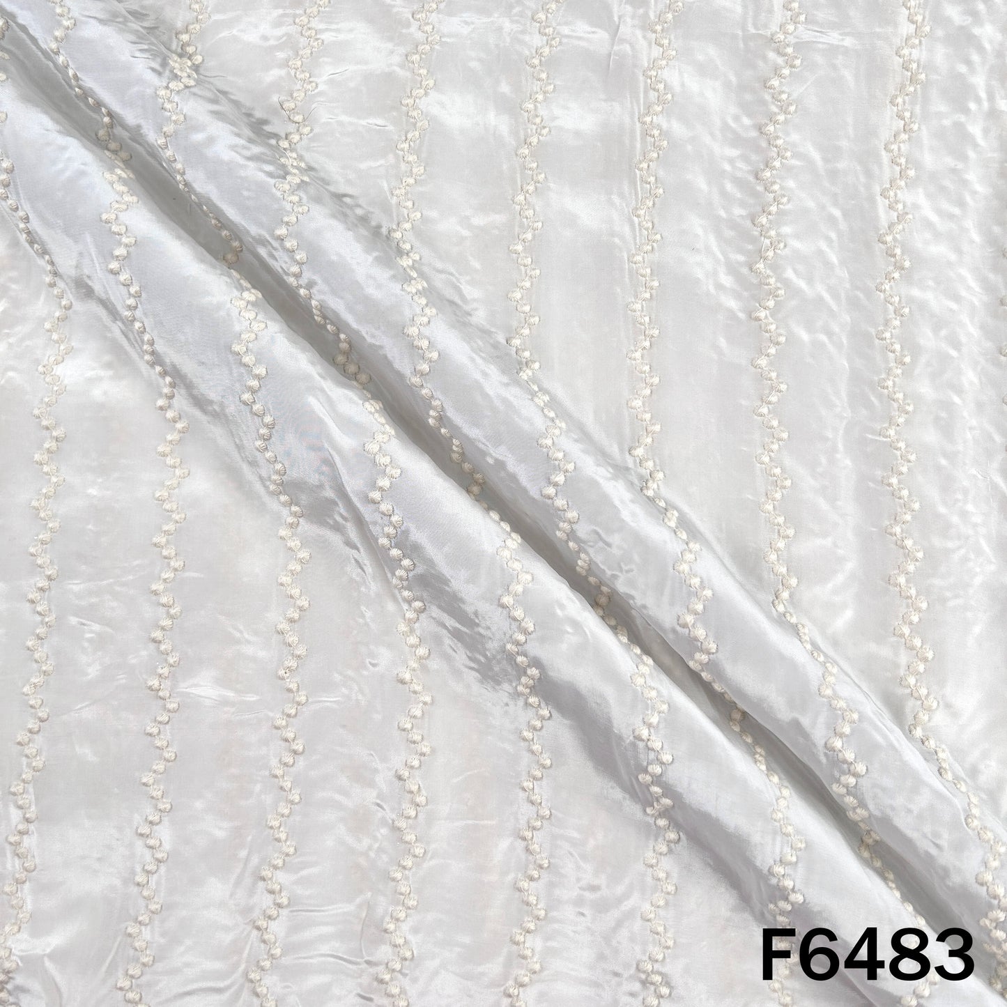 Dyeable Thread Embroidered Crepe Fabric - F6483
