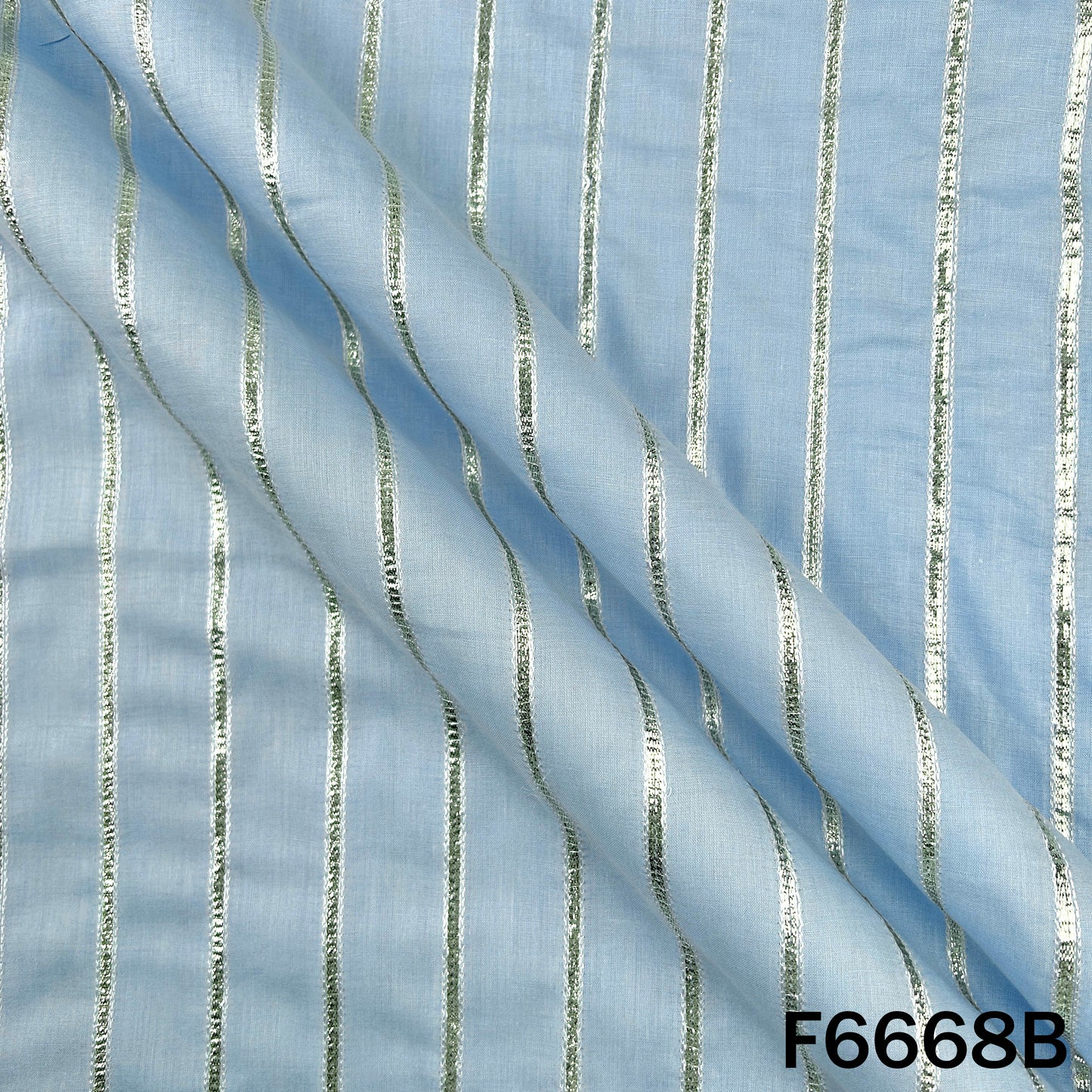 Gota Patti Cambric Cotton Fabric - F6668