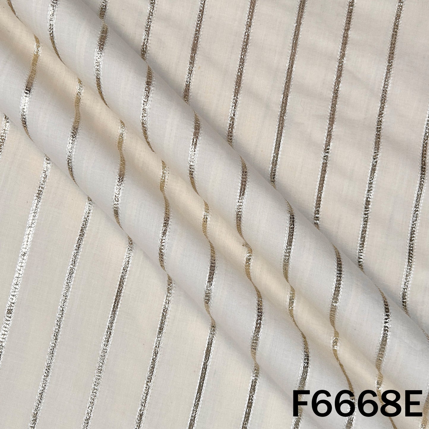 Gota Patti Cambric Cotton Fabric - F6668