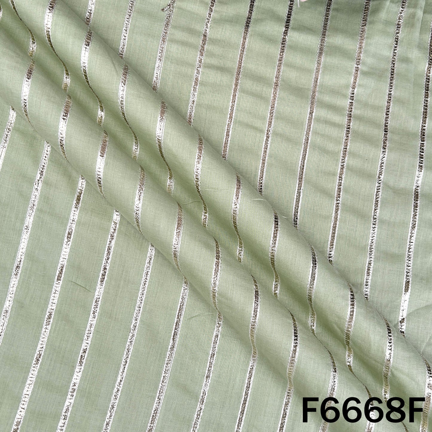 Gota Patti Cambric Cotton Fabric - F6668