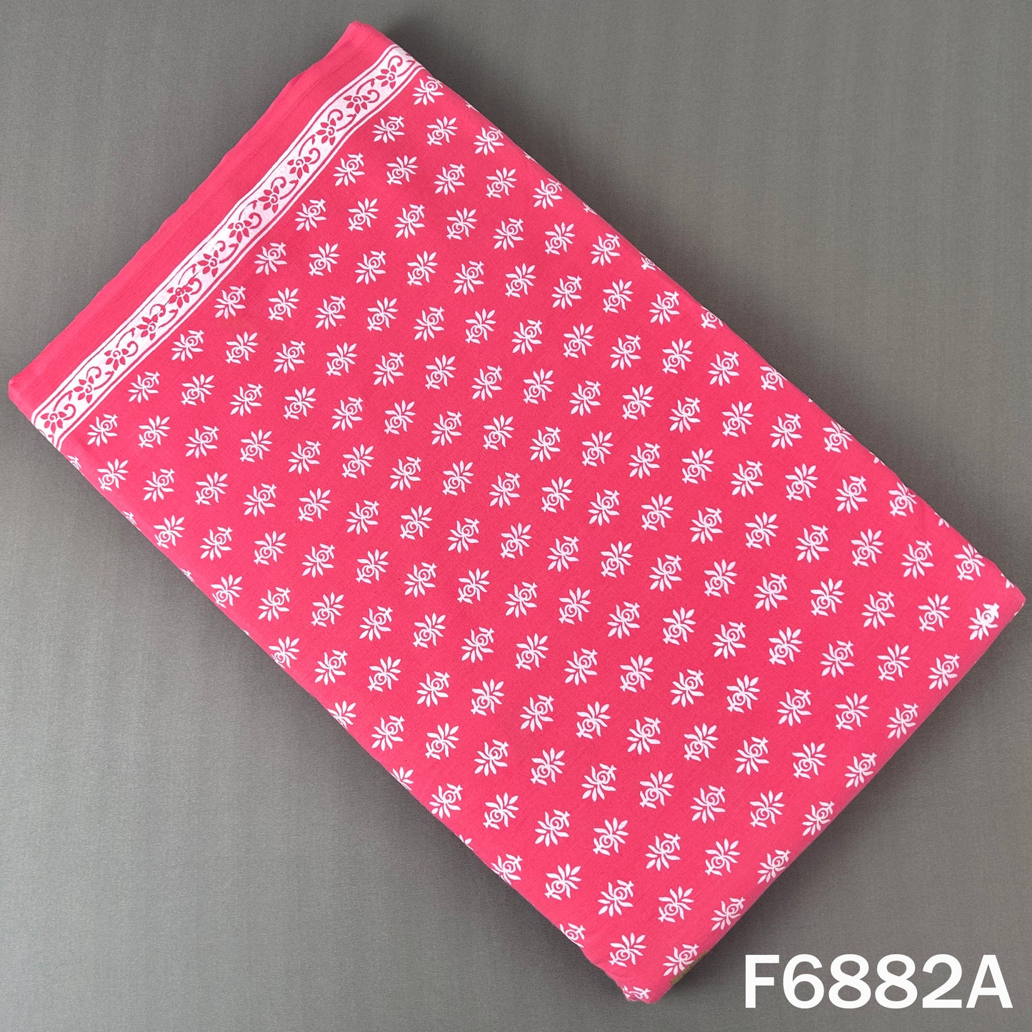 Bright pink cotton fabric F6882A with neat white floral block print pattern for ethnic outfits