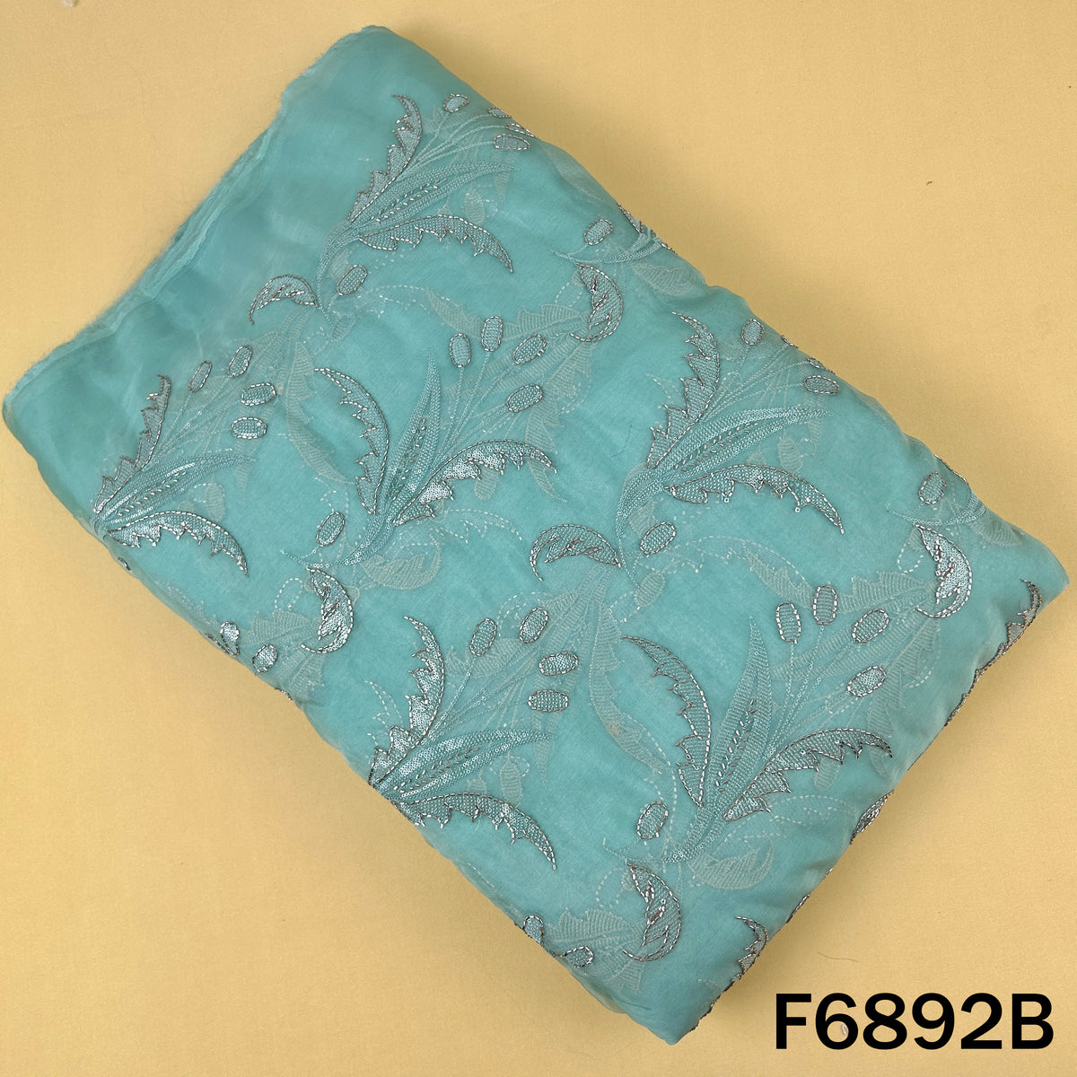 Aqua organza fabric F6892B featuring elegant floral thread work with shimmer detailing