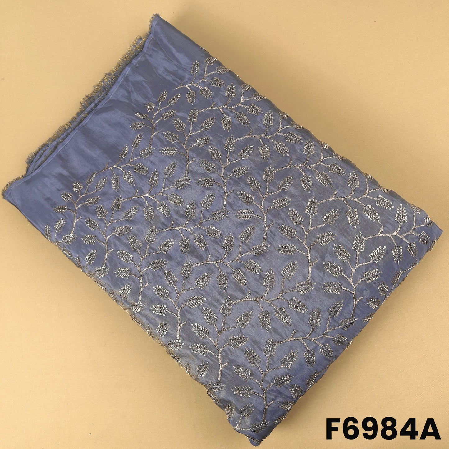 Blue shimmer tissue fabric F6984A featuring elegant all-over floral embroidery with zari and sequins work