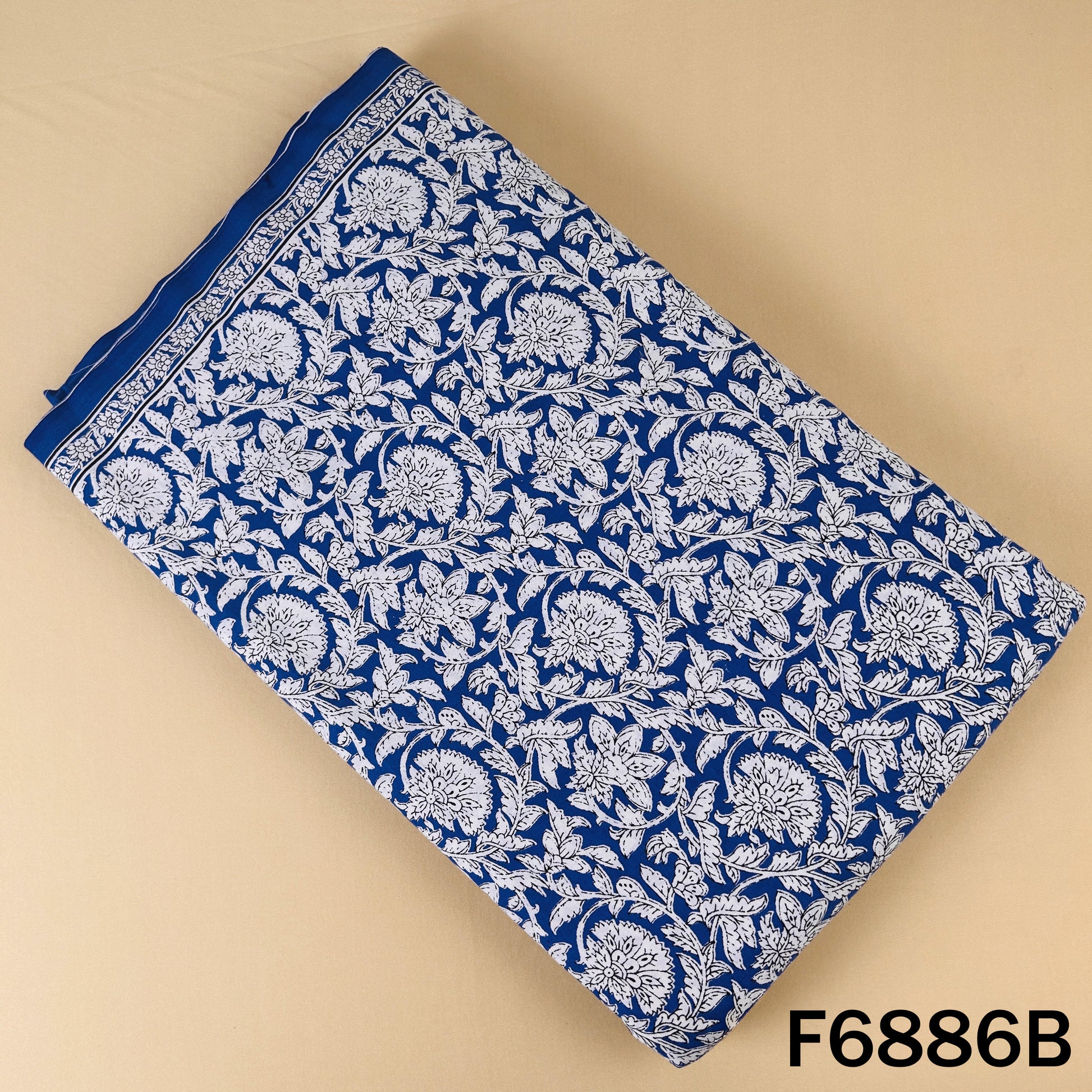Blue floral print cotton fabric F6886B featuring elegant white flower motifs for ethnic outfits