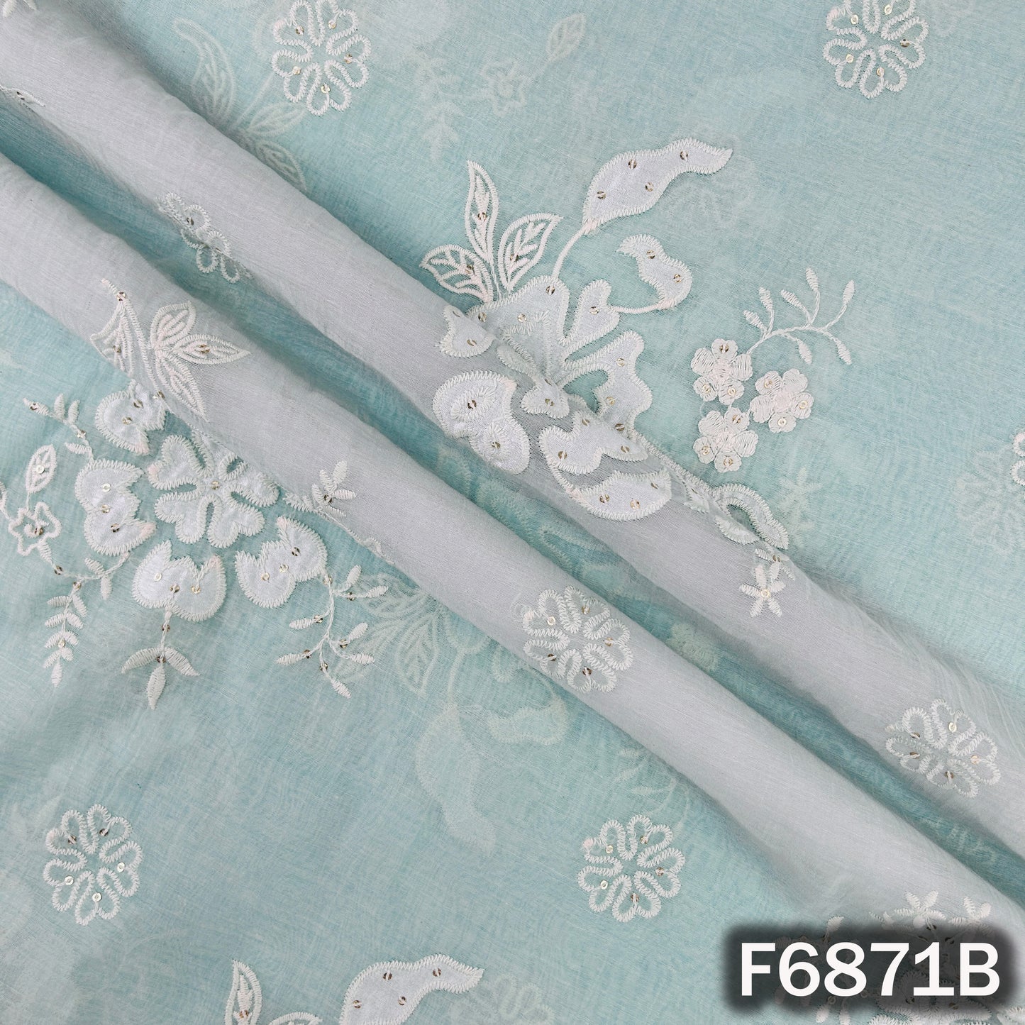 Detailed view of blue Mul Chanderi fabric F6871B with thread sequins work