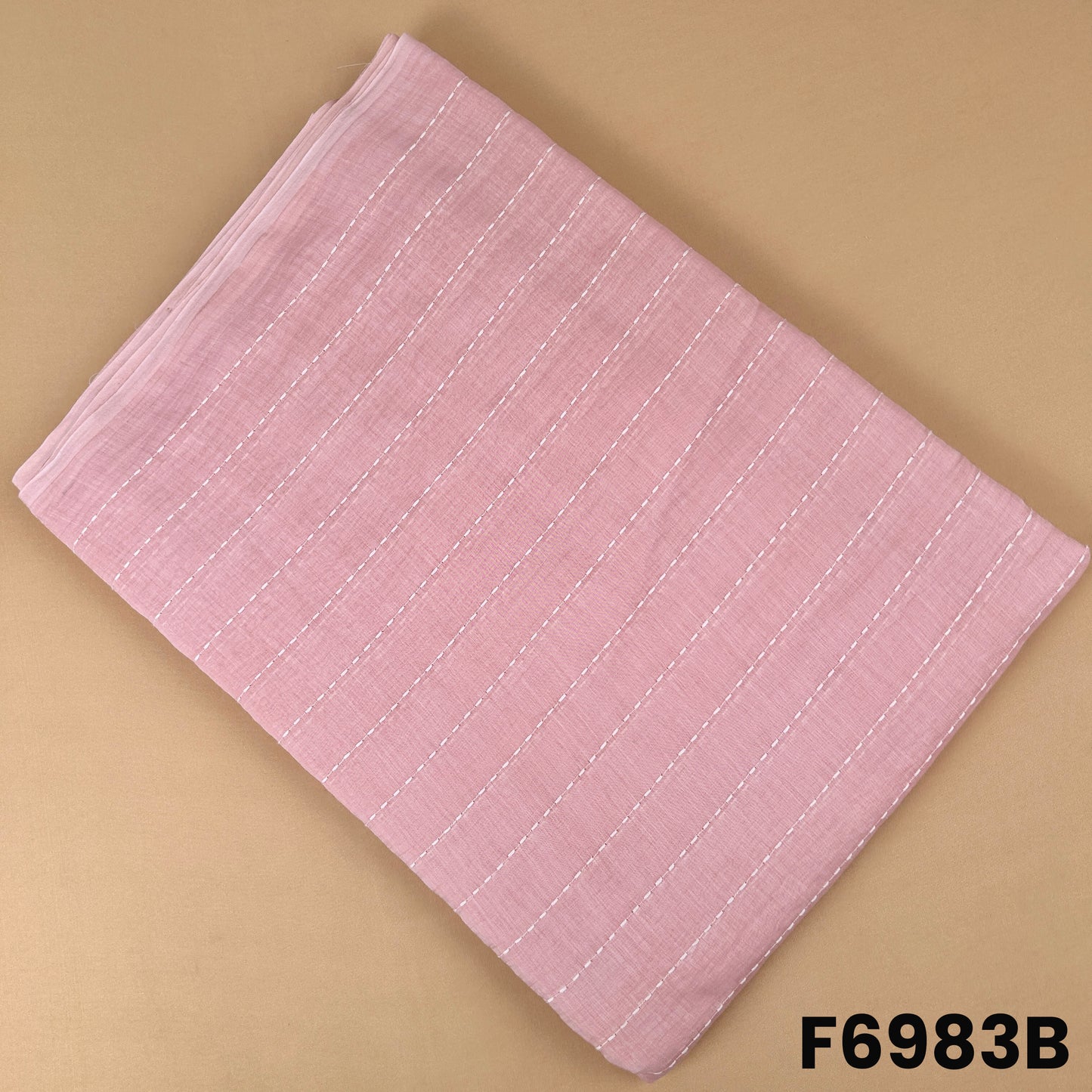 Blush pink Mul Chanderi fabric F6983B designed with delicate thread stripes for elegant ethnic wear