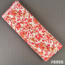 Folded rayon fabric F6955 featuring coral red botanical flowers with olive leafy accents on a soft ivory background