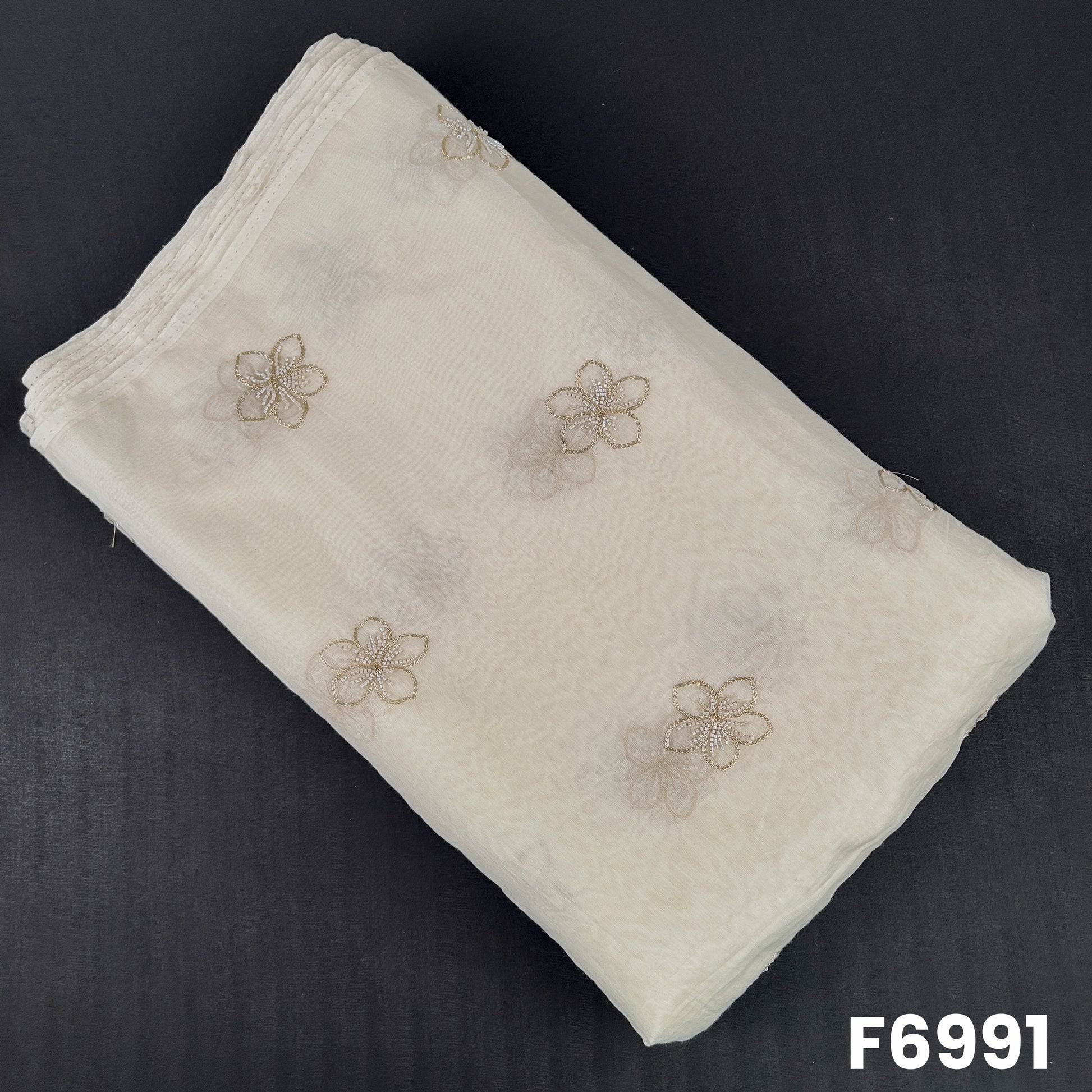Dyeable Chanderi Silk fabric F6991 with handcrafted floral butti motifs in cut dana and zari work on an off-white base