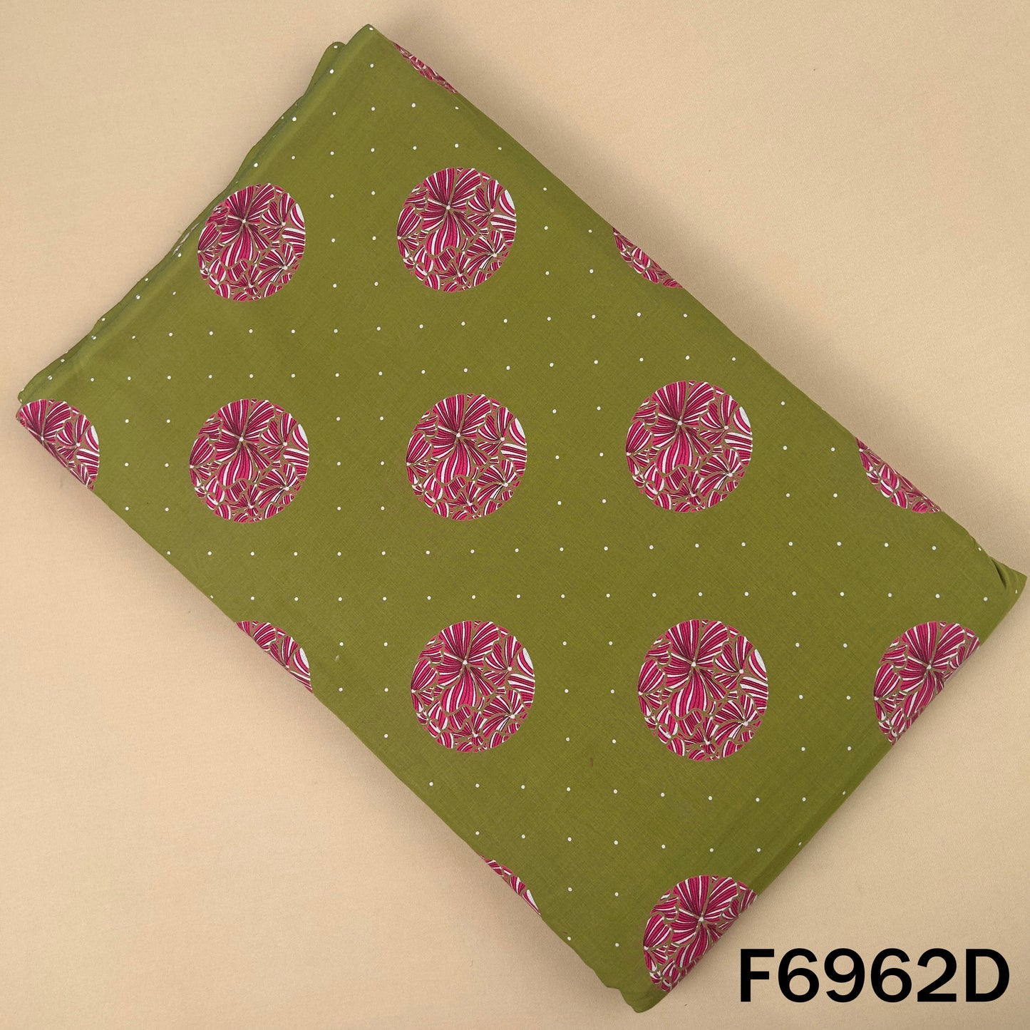 Earthy green Printed Cotton fabric F6962D decorated with pink round floral patterns for kurtis and suits