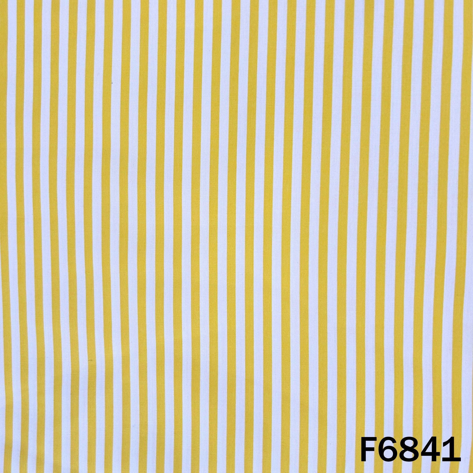 Close pattern view of F6841 showing neat vertical yellow, white and blue stripes with a smooth cotton finish