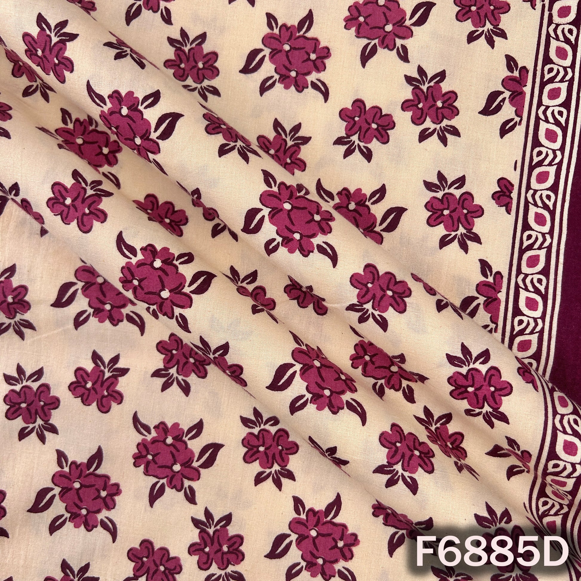 Close view of F6885D maroon cotton fabric displaying detailed buta print and premium ethnic styling