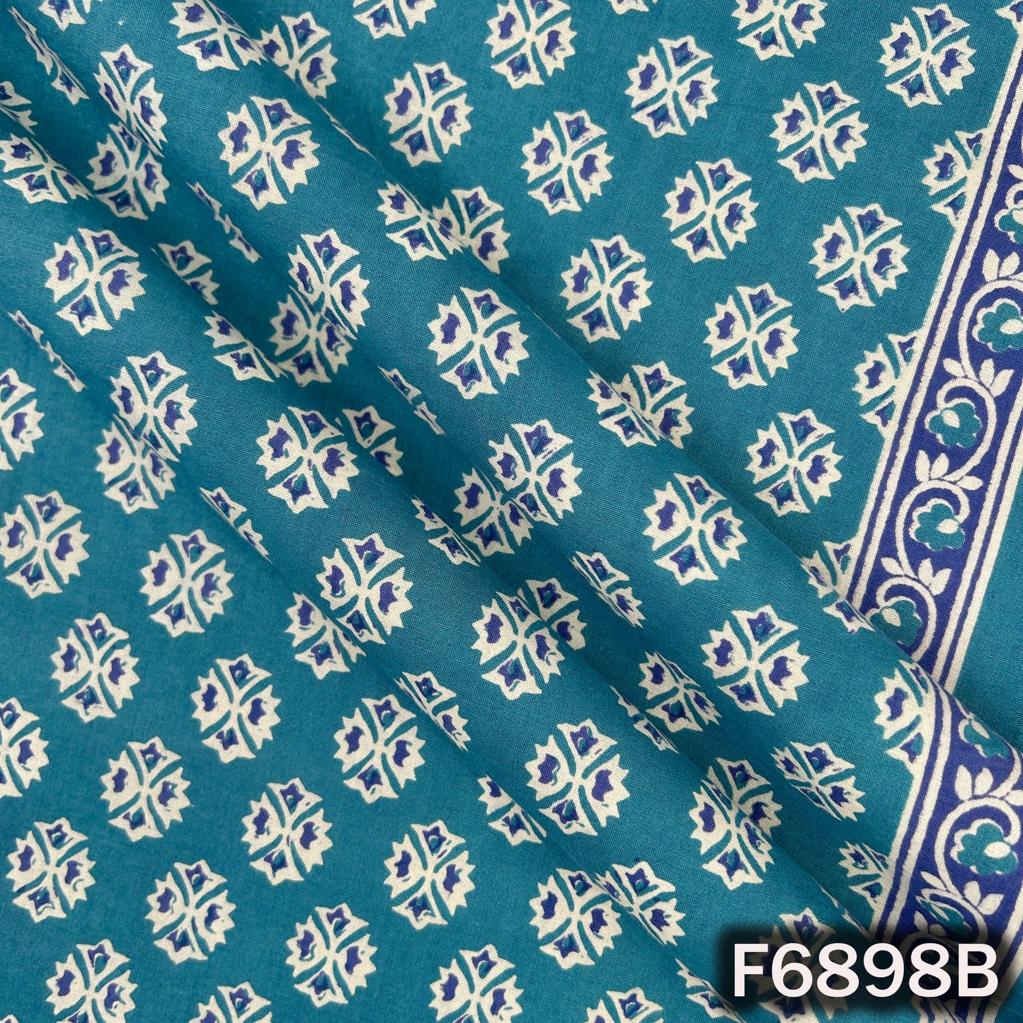Detailed blue cotton fabric F6898B highlighting crisp white print work and soft breathable finish