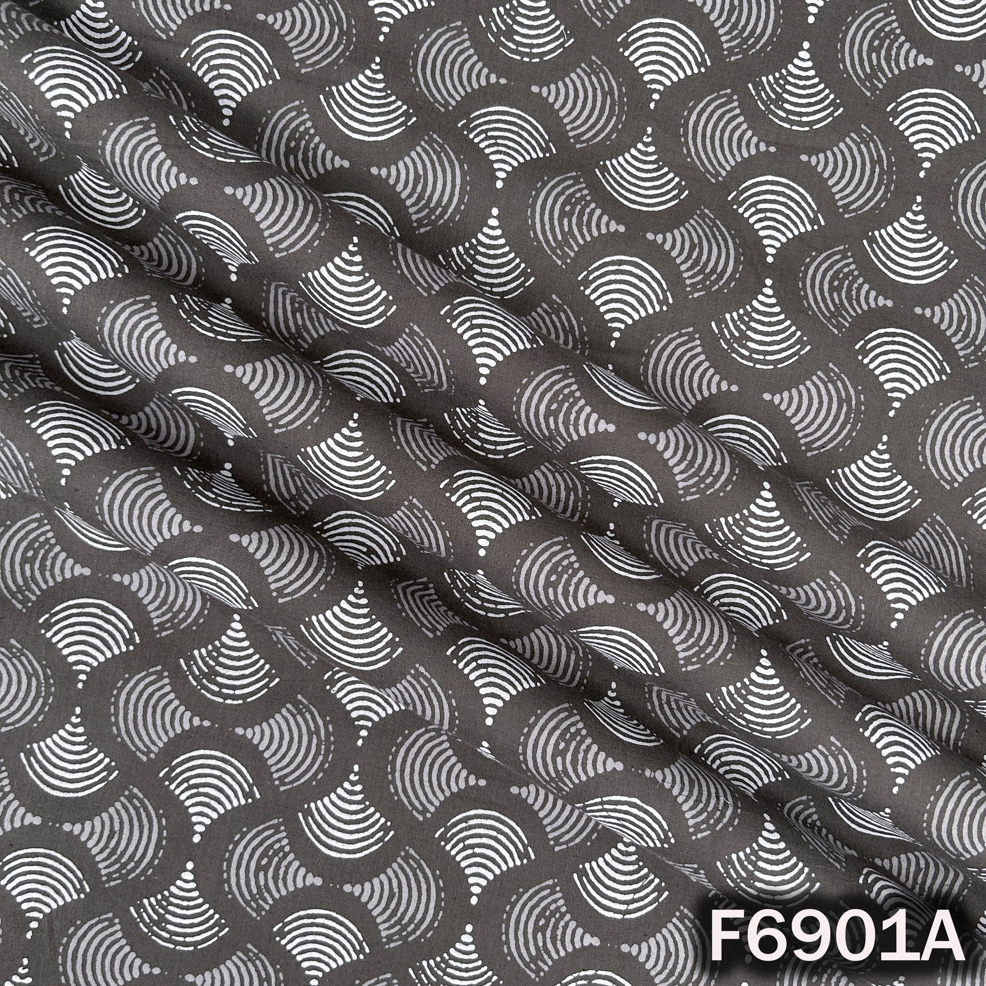 Enlarged F6901A view revealing curved botanical shapes and consistent print placement
