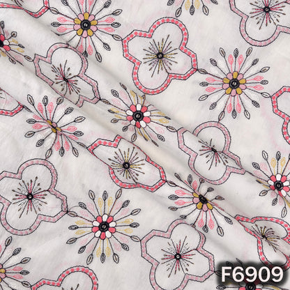 Draped Kora cotton fabric F6909 revealing lightweight folds, floral embroidery and delicate shimmer finish