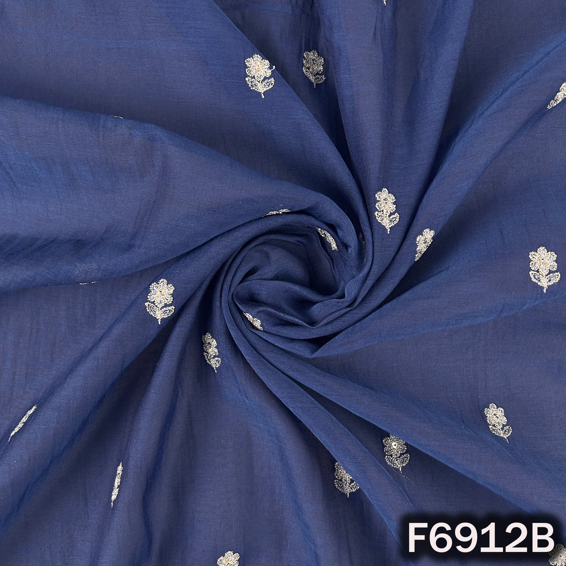 Detailed F6912B surface highlighting spaced embroidered buta work, graceful folds and premium Chanderi finish