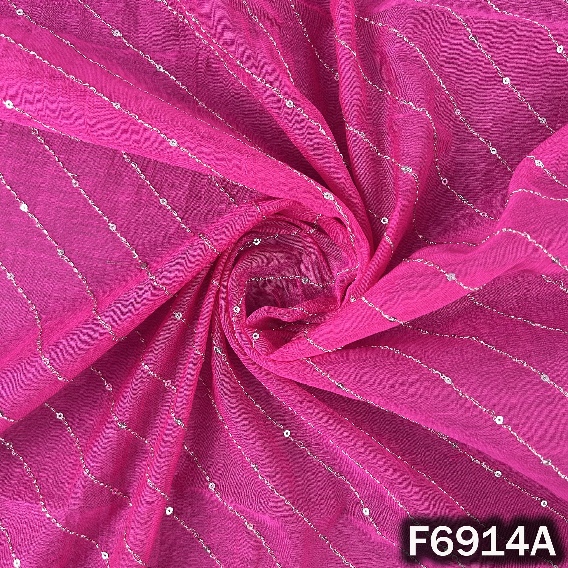 Enlarged F6914A view showing clean diagonal stripe work, soft fabric texture and festive shimmer