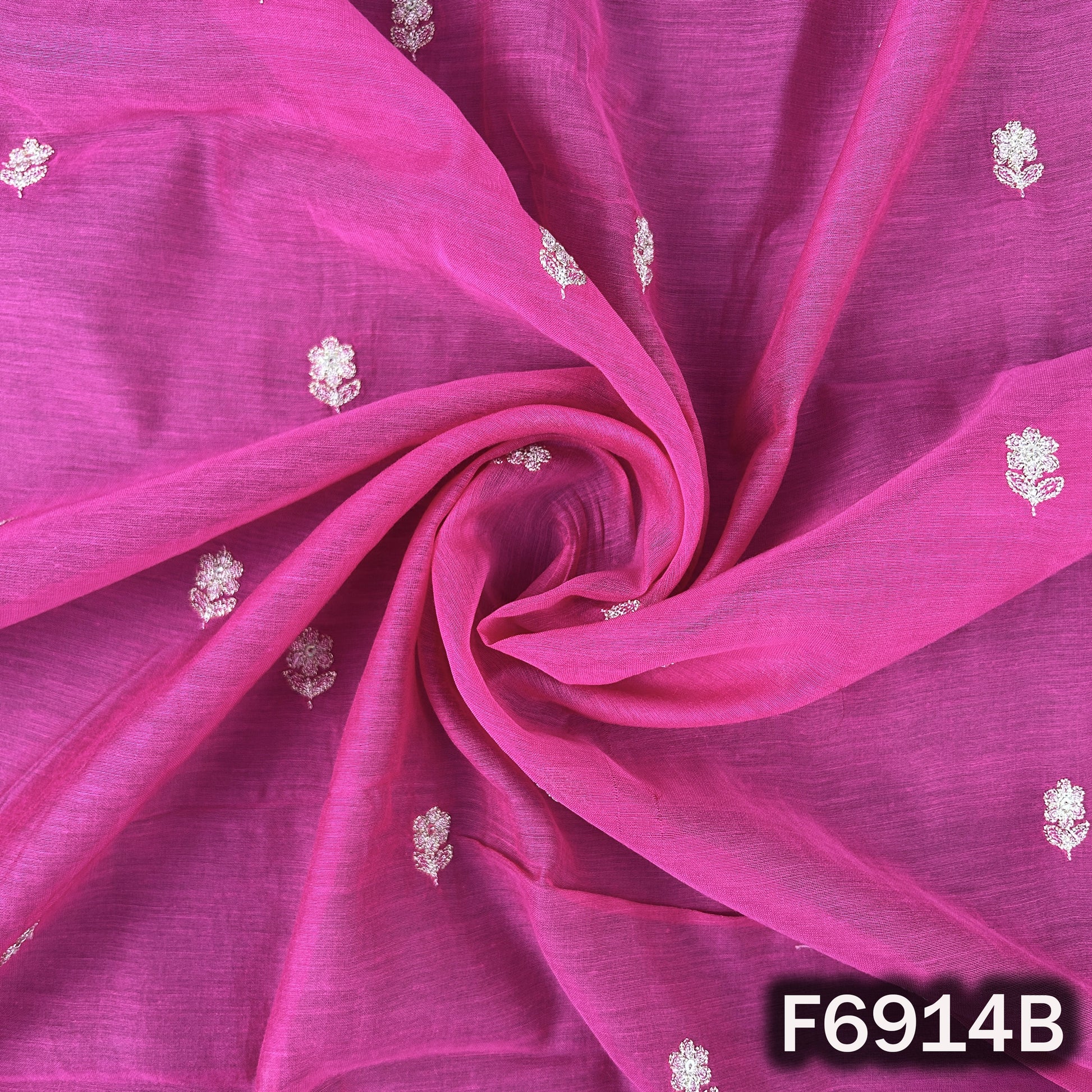 Close detail of F6914B highlighting scattered embroidered motifs, gentle folds and rich ethnic finish