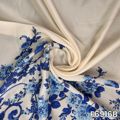 Draped F6916B fabric highlighting silky folds, bold blue flowers and smooth premium shine
