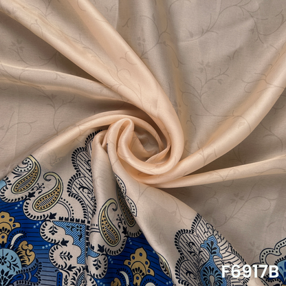 Draped F6917B fabric highlighting silky folds, soft beige tone and detailed blue print placement