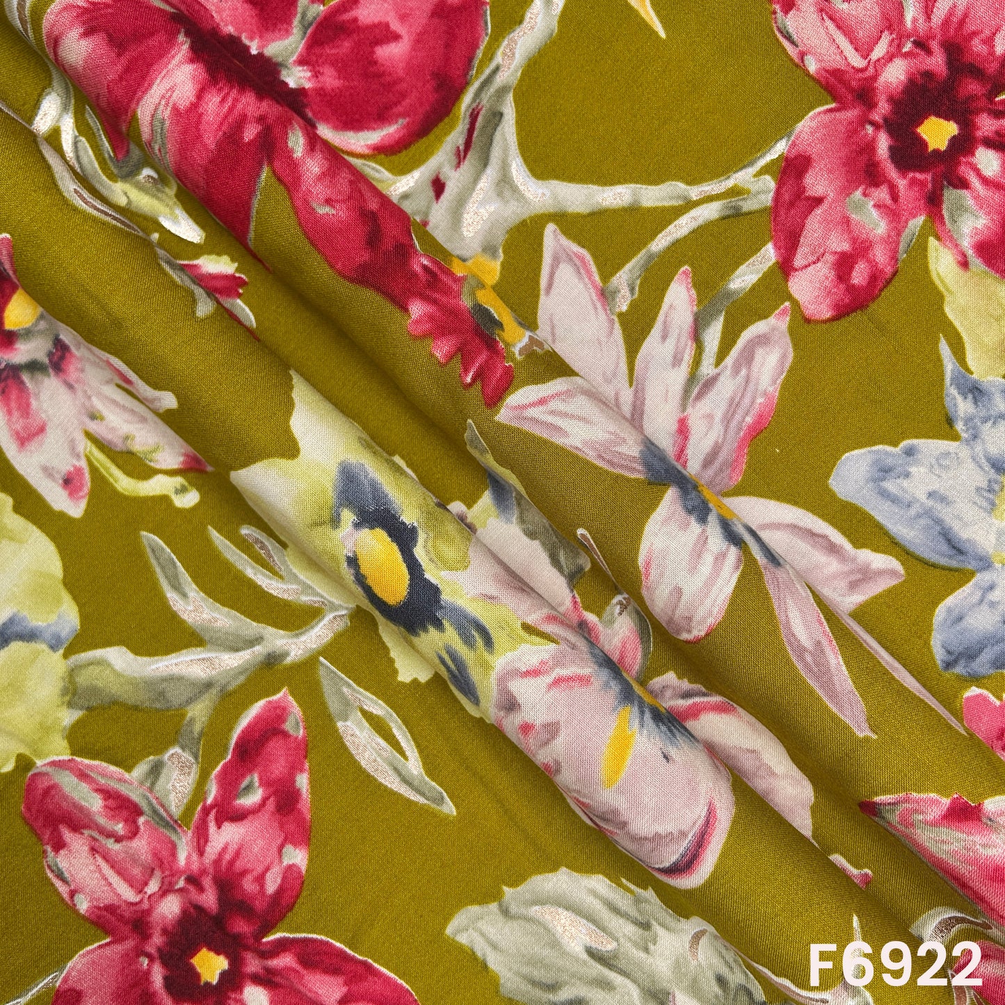Draped F6922 rayon fabric highlighting smooth folds, lightweight flow and subtle metallic foil accents
