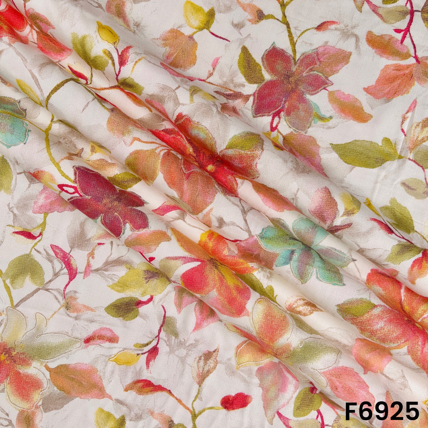 Draped F6925 rayon fabric highlighting smooth fall, lightweight texture and elegant watercolor print flow