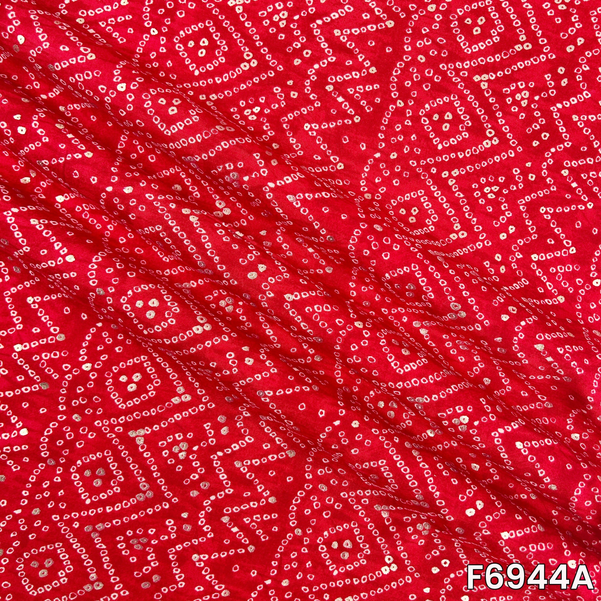 Enlarged F6944A view revealing zigzag lines, dotted diamonds and reflective foil highlights