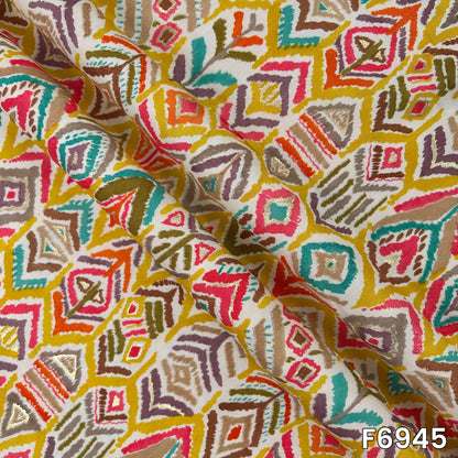 Close-range image highlighting the smooth drape, detailed motifs and delicate foil shimmer of design F6945