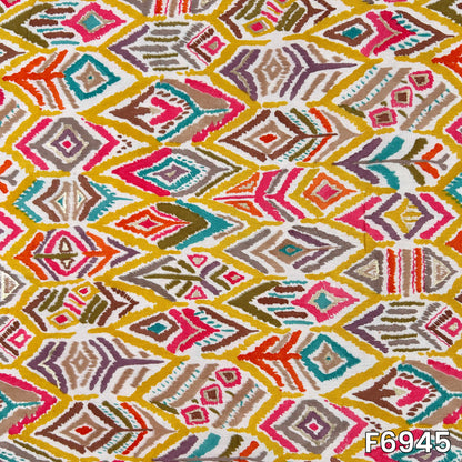Flat fabric view revealing intricate tribal diamonds and lively color combinations across the white rayon base