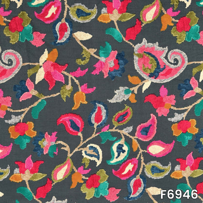 Flat view of design F6946 revealing colorful flowers, curved paisleys and leafy accents across a dark background
