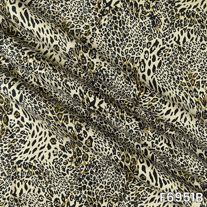 Magnified olive F6951B fabric image highlighting irregular spots, fluid folds and lightweight texture