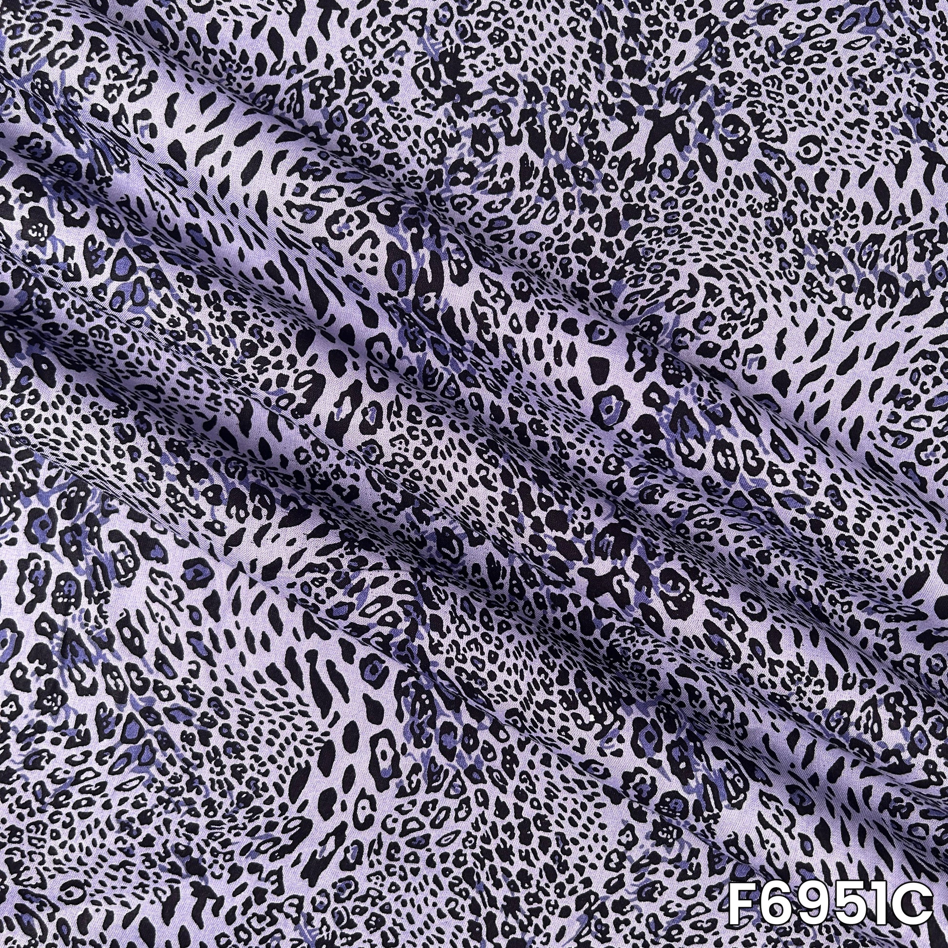 Close inspection of F6951C showing purple-grey animal markings with crisp contrast and graceful drape