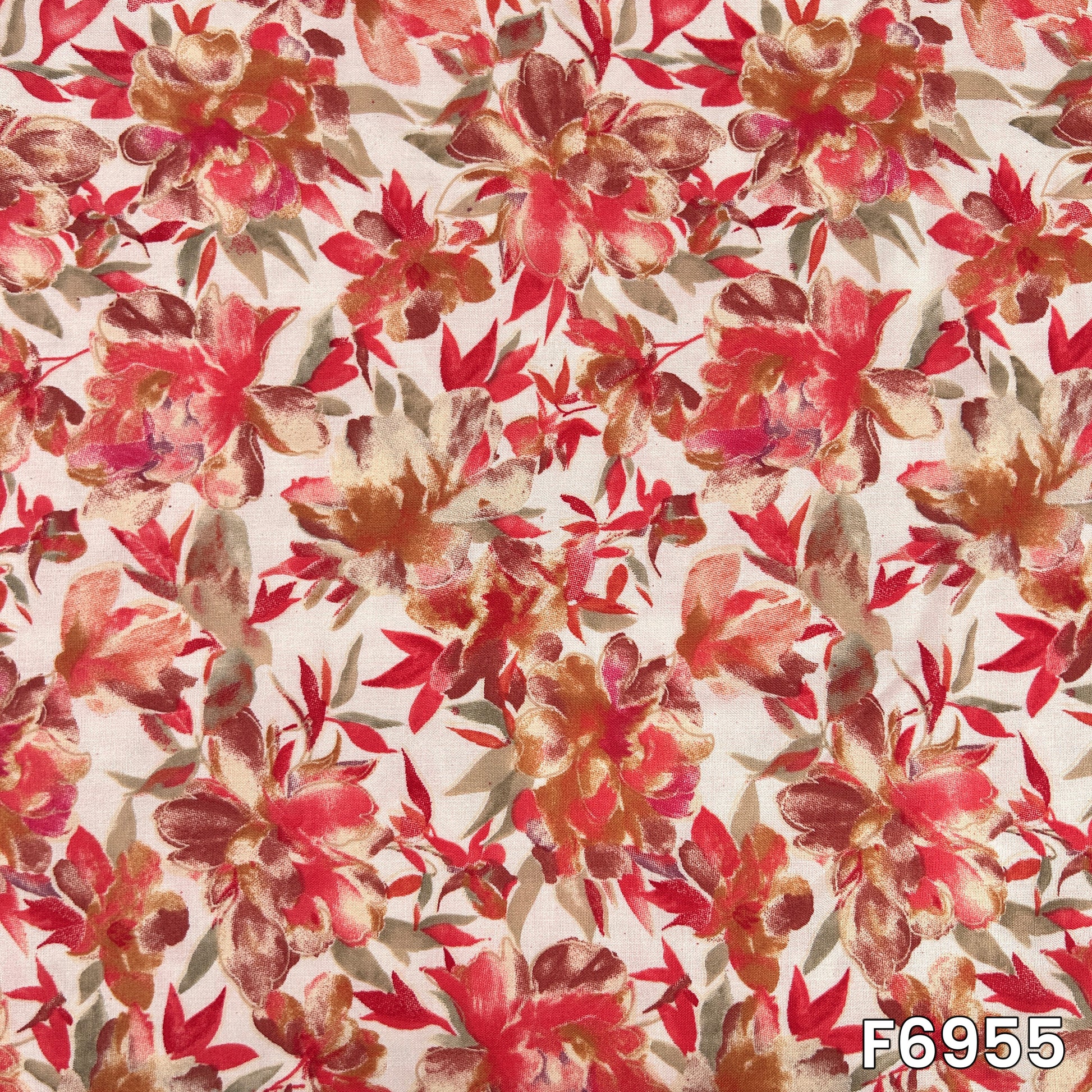 Detailed fabric view presenting scattered red blossoms, slender stems and earthy foliage across the pale rayon surface