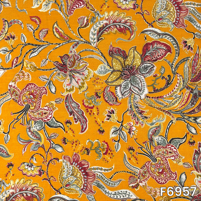 Full pattern view of F6957 revealing curved paisleys, fine leaves and ornamental flowers across the bright base