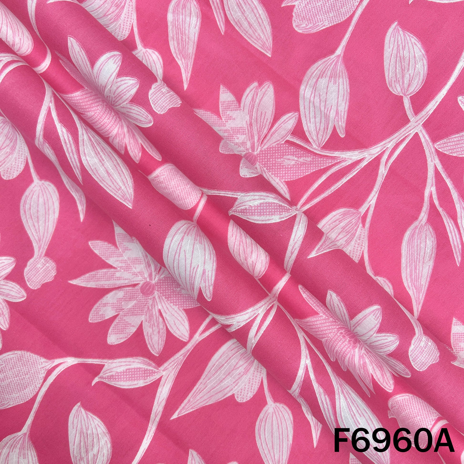Close view of F6960A showing large floral outlines, smooth cotton texture and fresh summer styling