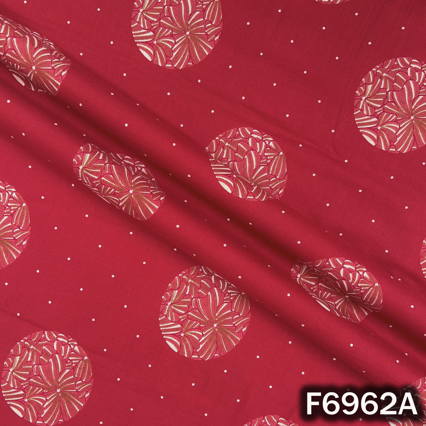 Close view of F6962A showing detailed round flower patterns, soft cotton texture and clean print finish