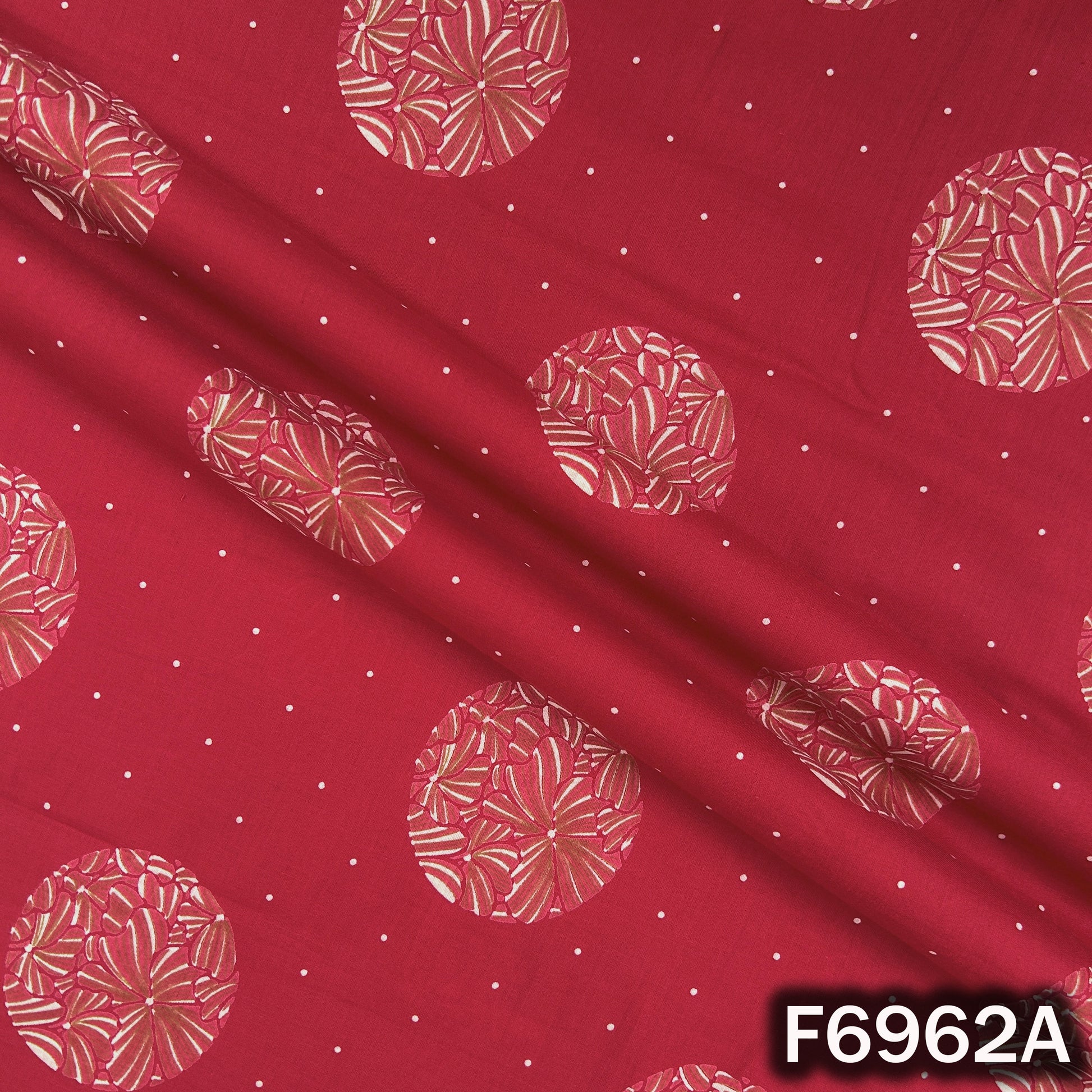 Close view of F6962A showing detailed round flower patterns, soft cotton texture and clean print finish