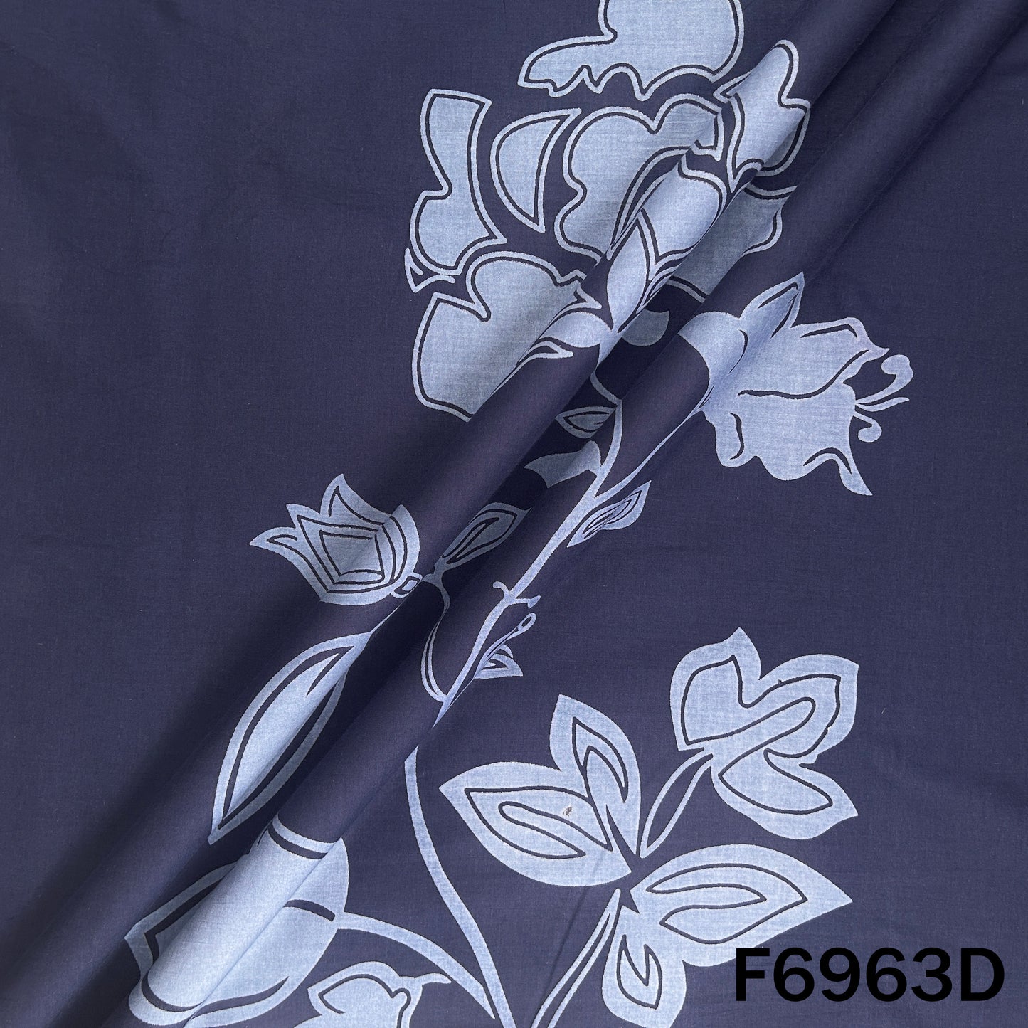 Detailed navy F6963D fabric image showing bold flower print, rich dark base and smooth finish