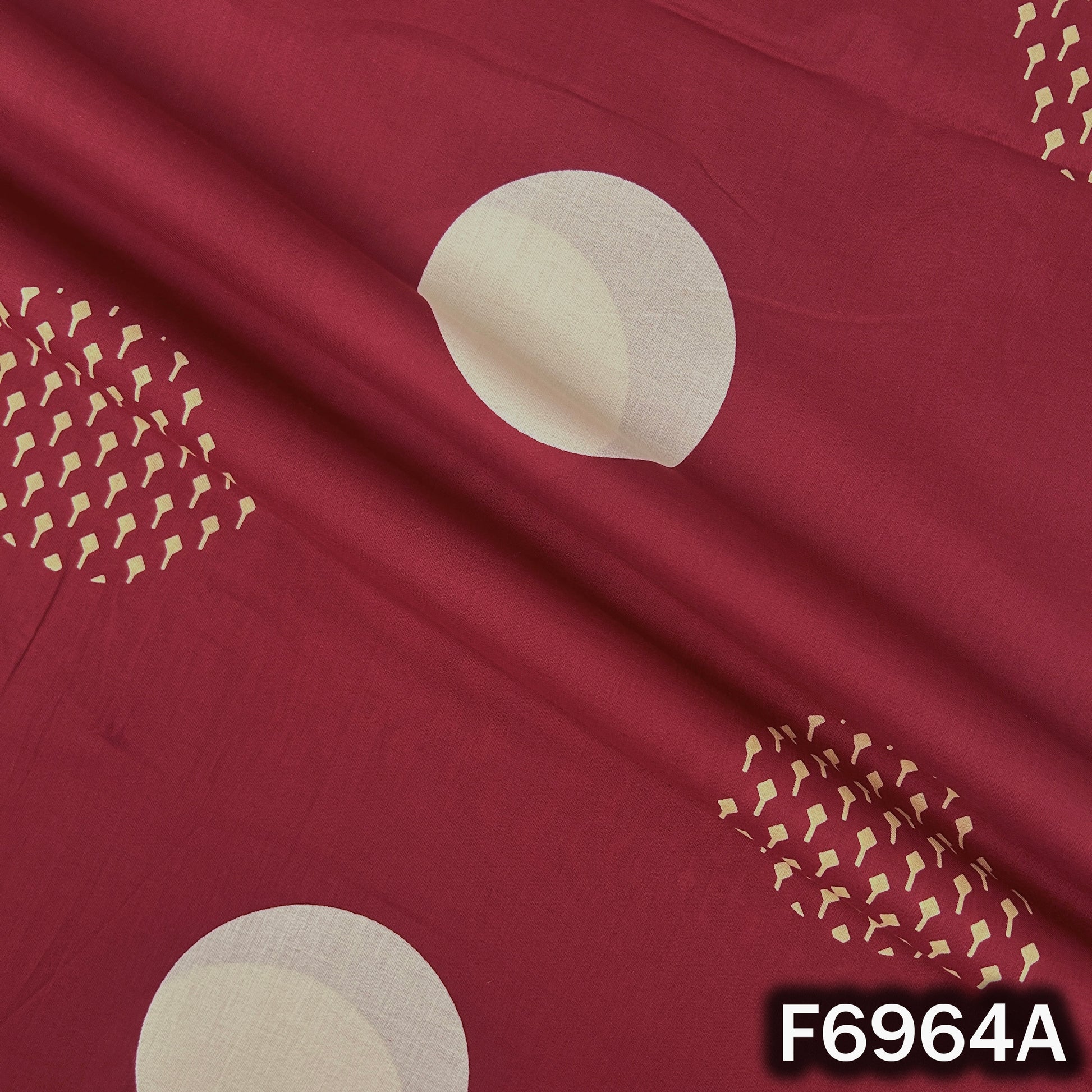 Close view of F6964A showing large polka dots, textured small dot clusters and smooth cotton finish