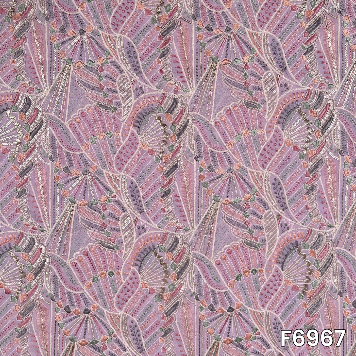 Close pattern view of F6967 showing intricate thread lines, sequins highlights and soft geometric embroidery