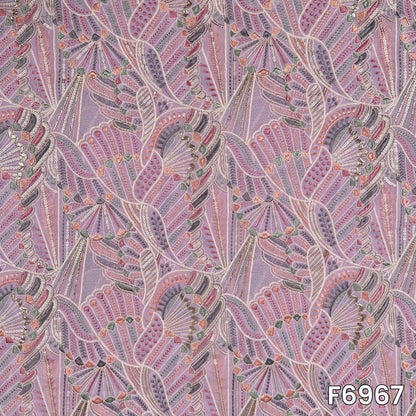 Close pattern view of F6967 showing intricate thread lines, sequins highlights and soft geometric embroidery