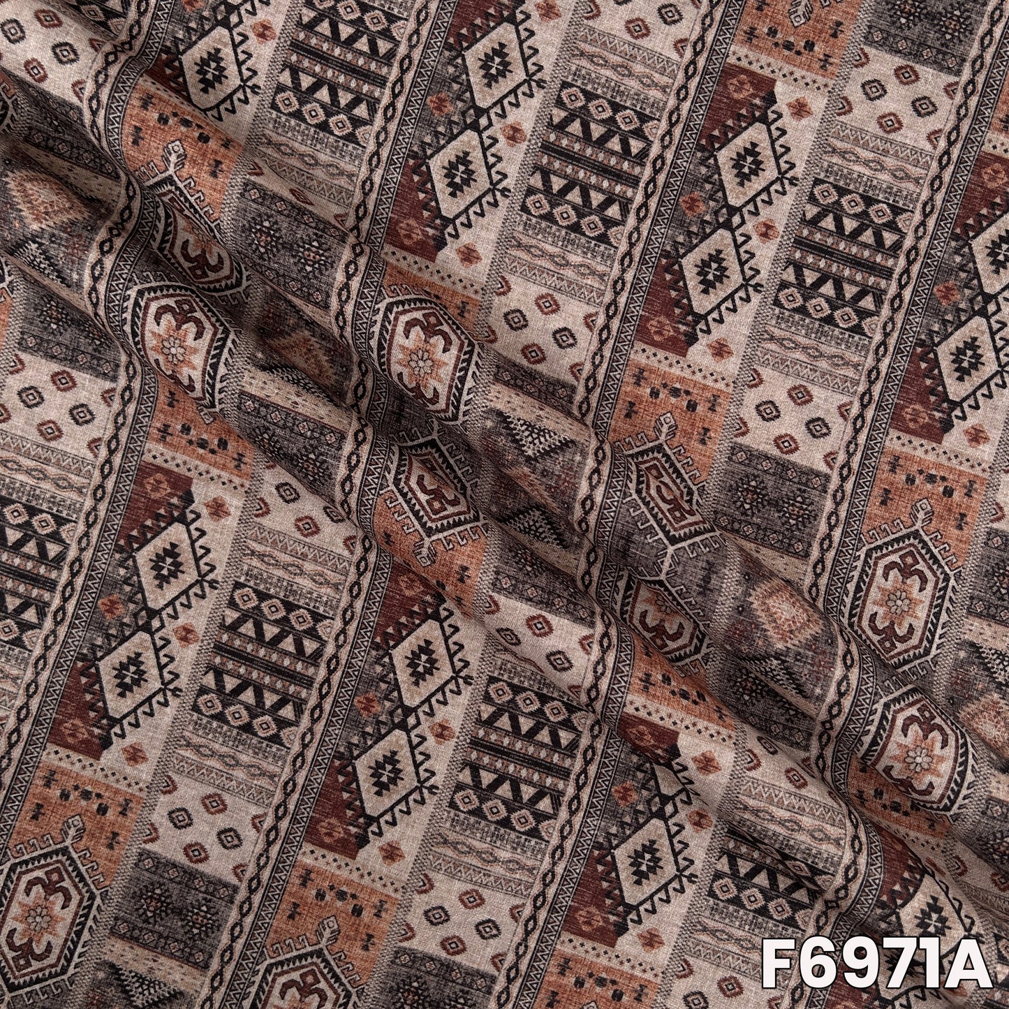 Close view of F6971A showing fine tribal motifs, earthy color balance and natural linen texture