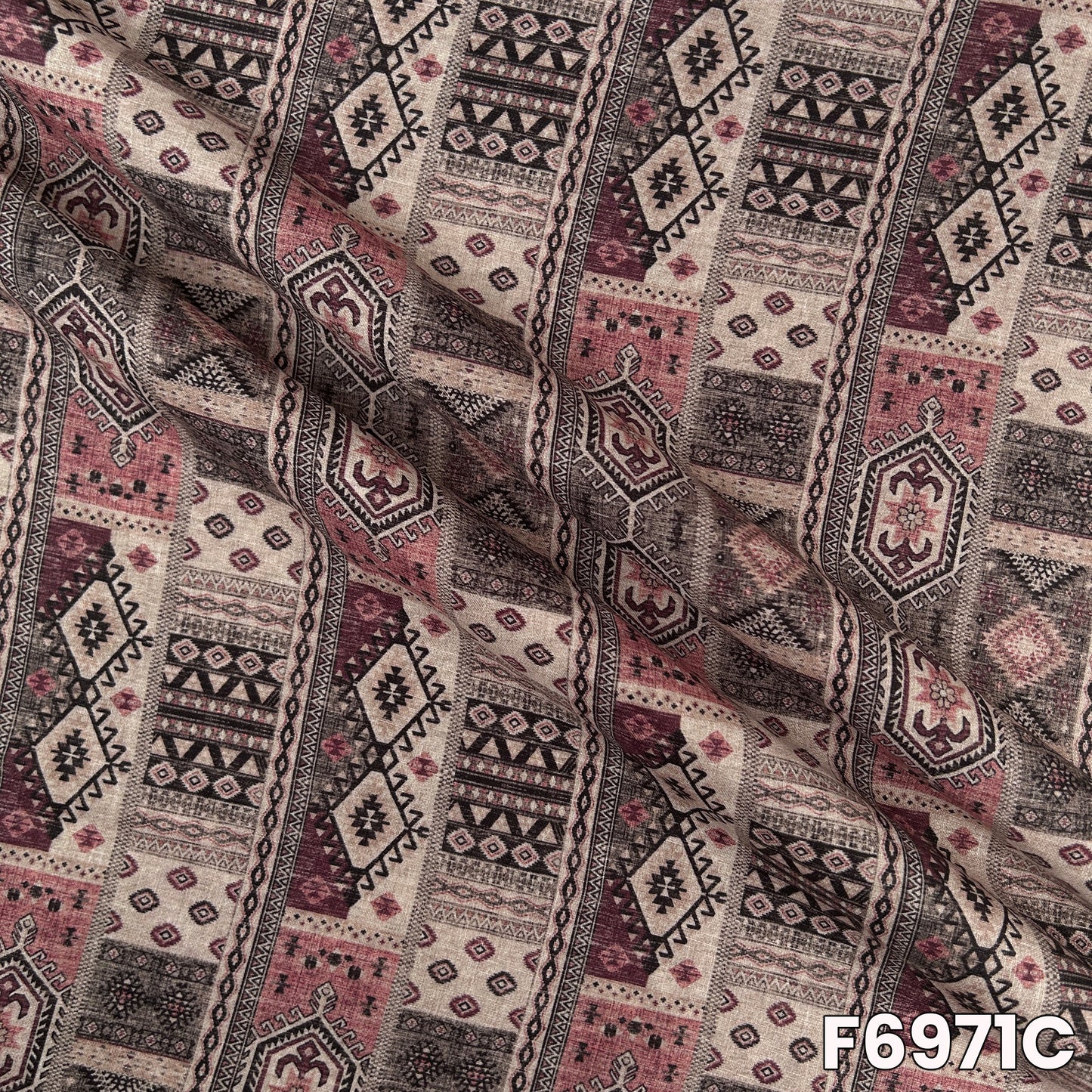 Close-up of F6971C displaying layered geometric blocks, muted tones and refined linen-style finish